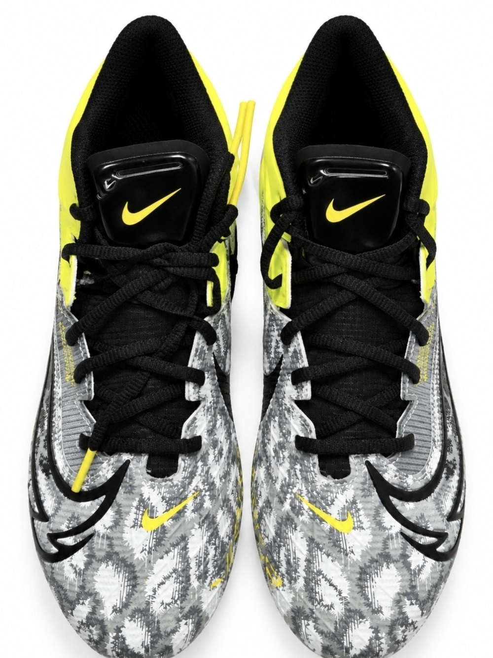 The Nike Vapor Edge Elite 360 Football Cleats in Yellow